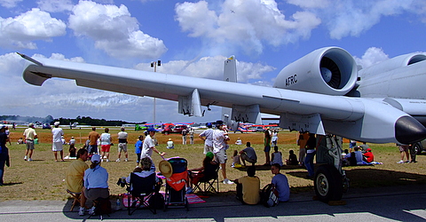 A Fairchild A-10 Thunderbolt II a.k.a. "Warthog" being used as an expensive umbrella during the airshow.